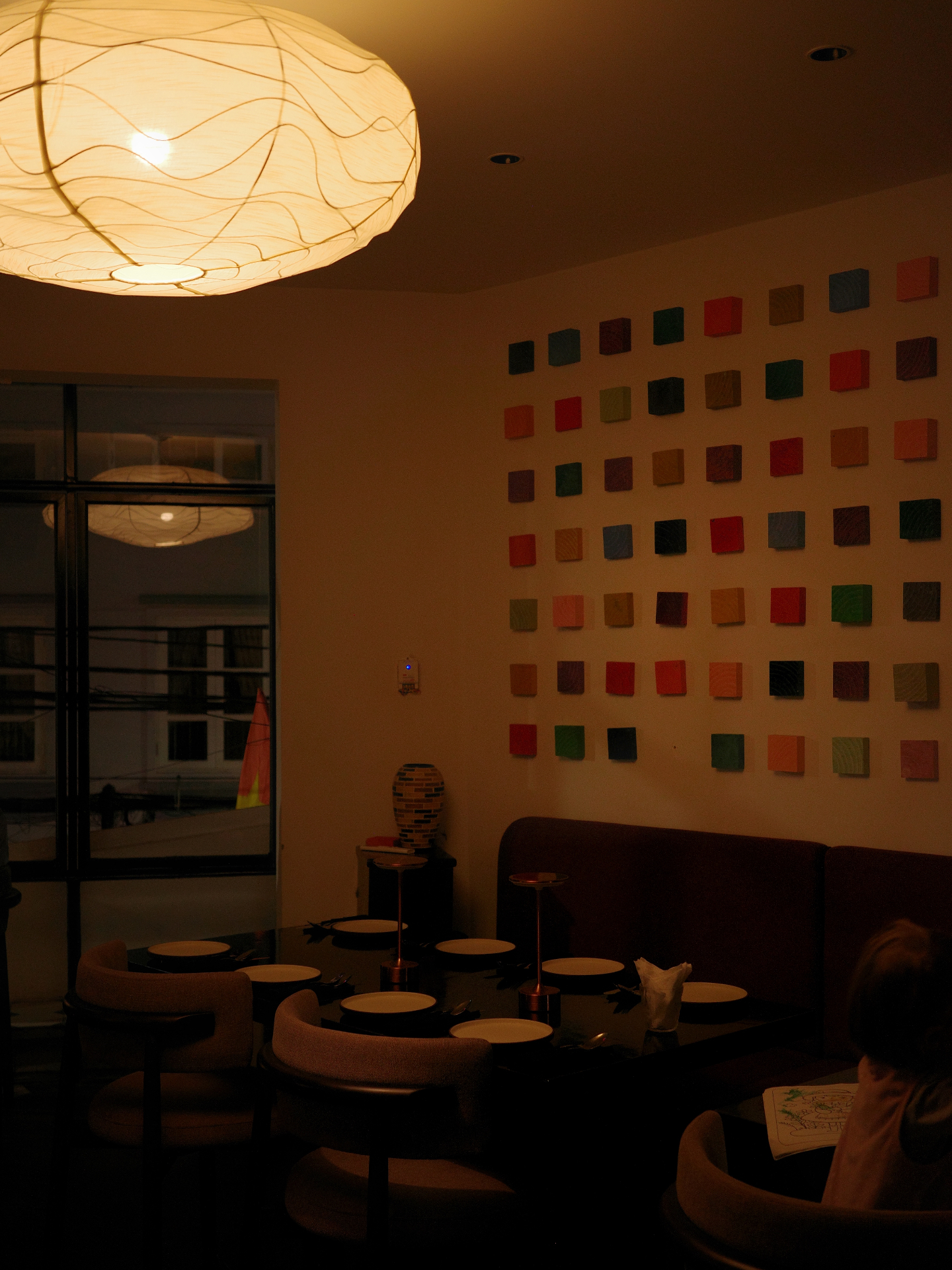 Cháy! dining room with colorful wall